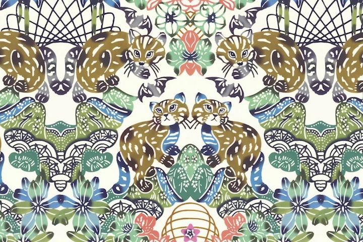 イリオモテヤマネコを中心に様々な動植物が表された紅型作品